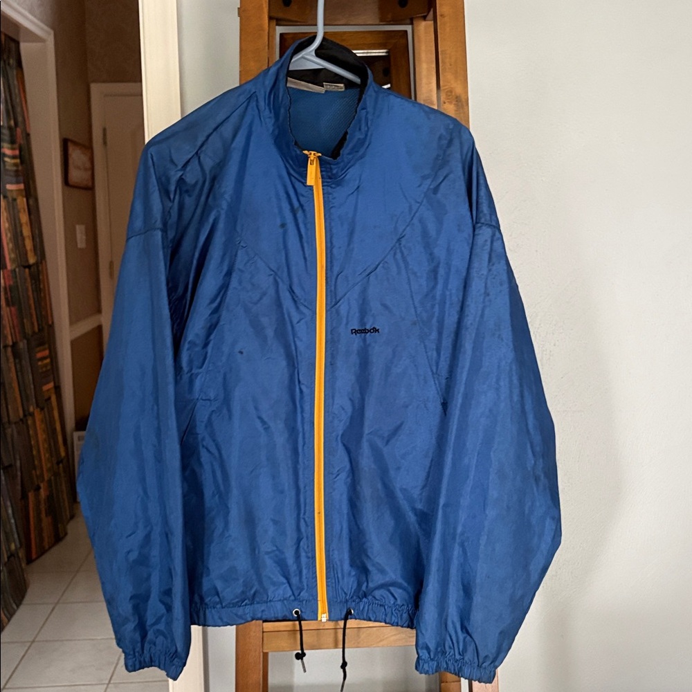 Vintage Reebok 1980s windbreaker jacket blue and yellow